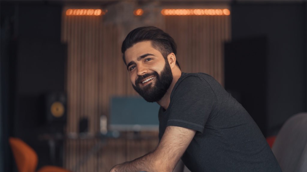 man smiling with beard